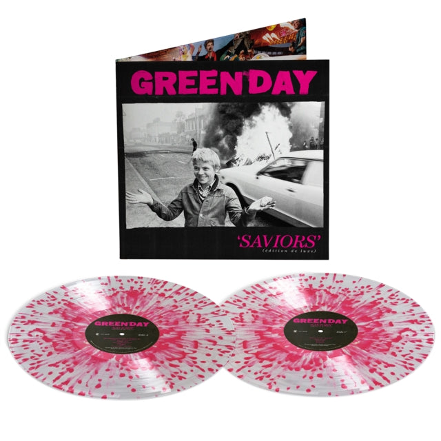 Green Day "Saviours (edition de luxe)" album cover, shown with 2 clear with hot pink splatter colored vinyl records