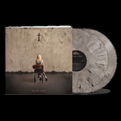 Album cover with a person sitting on a chair against a wall with a cross, titled 'Dear God'. Shown with 2 tan and black marble colored vinyl records
