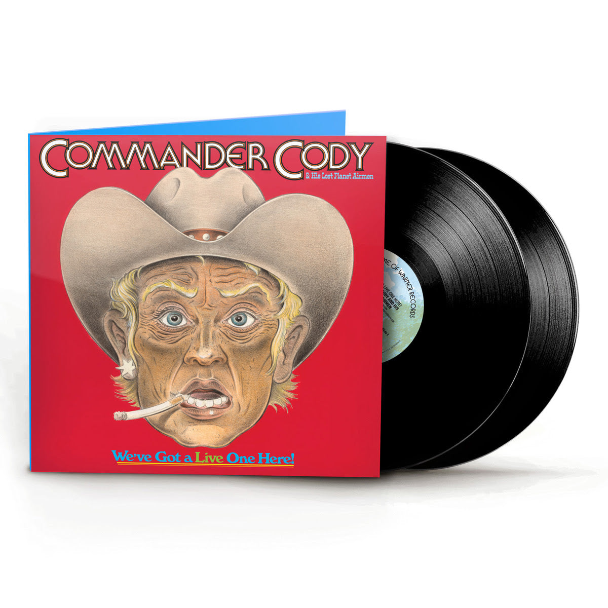 Vinyl records with a red album cover featuring a person in a cowboy hat and text 'Commander Cody & The Lost Planet Airmen'.