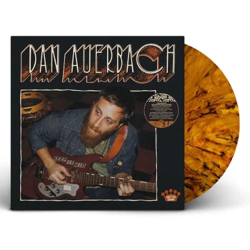 Dan Auerbach - Keep It Hid album cover and tiger's eye vinyl.
