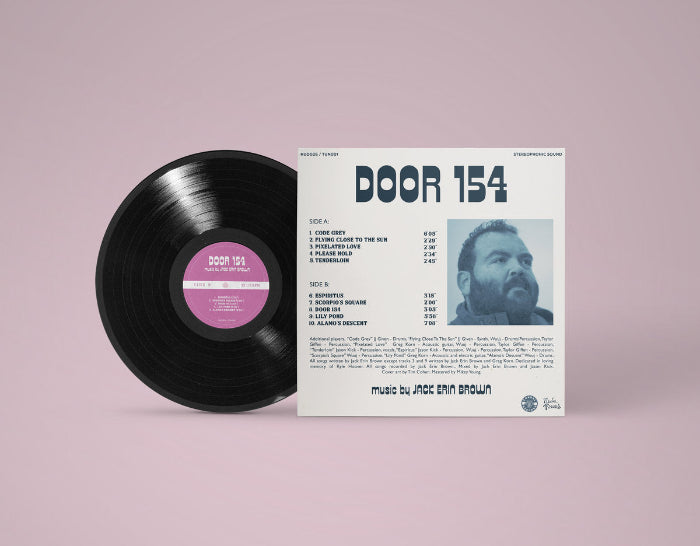 Jack Erin Brown "Door 154" back cover shown with a black vinyl record
