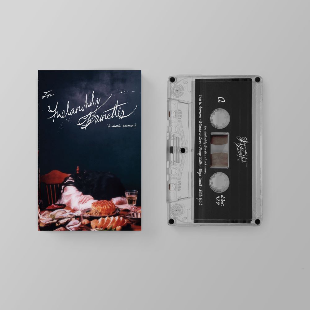Japanese Breakfast "For Melancholy Brunettes (and sad women)" cassette cover shown with a clear & black cassette tape