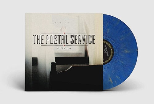 The Postal Service Give Up album art and blue vinyl record