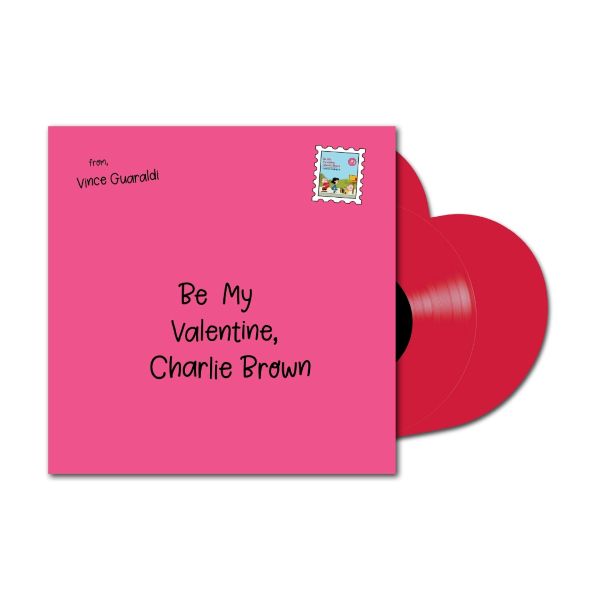 Red vinyl record with pink sleeve featuring 'Be My Valentine, Charlie Brown' text and a heart-shaped cutout.