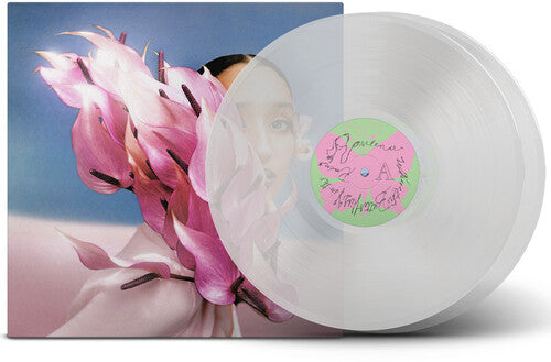 Raveena - Where the Butterflies Go in the Rain album cover and clear vinyl.