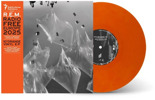 REM - Radio Free Europe 2025 album cover and orange vinyl.