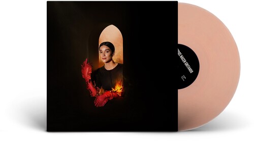 St. Vincent - Todos Nacen Gritando album cover and translucent rose vinyl.