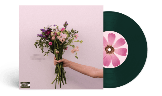 Olivia Rodrigo exclusive 7 inch album cover featuring a hand holding flowers, shown with a green vinyl record with a pink flower design on the label
