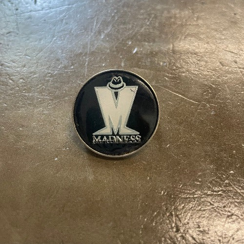 Madness Enamel pin White text against black backdrop