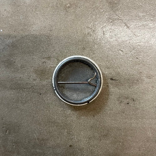 Madness Pin Back with some aging and surface rust