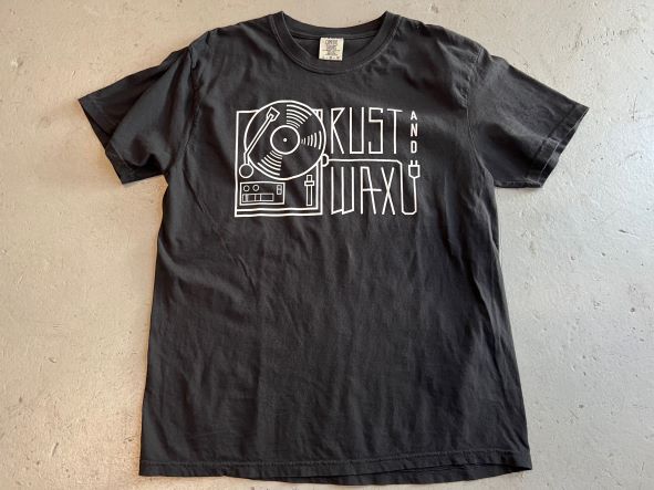 Rust and Wax Turntable logo printed in white ink on a black t-shirt