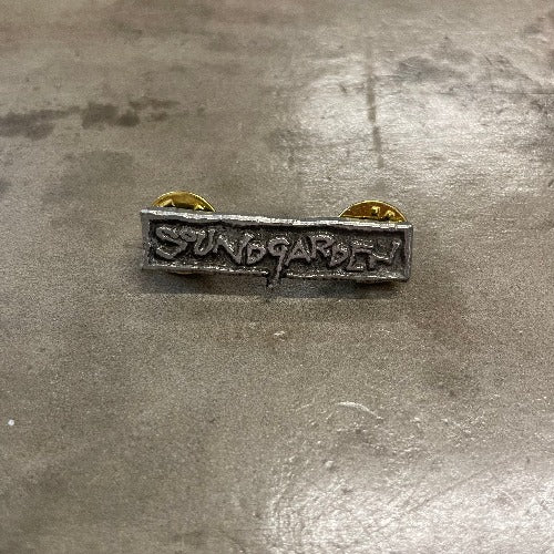 Soundgarden Stamped Metal pin Front image