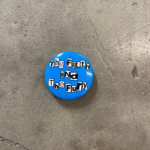 The Filth and the Fury Pin - Front black text on blue backdrop