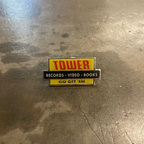 Tower Records Enamel Pin - Front image "Tower Records Video Books Go Get Em"