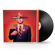 Album cover for Ministry Filthpig showing bloody man in a suit and die holding an american flag with 'Ministry Filthpig' text across his eyes against a red backdrop and 2 black vinyl records peeking out the side of the record sleeve.