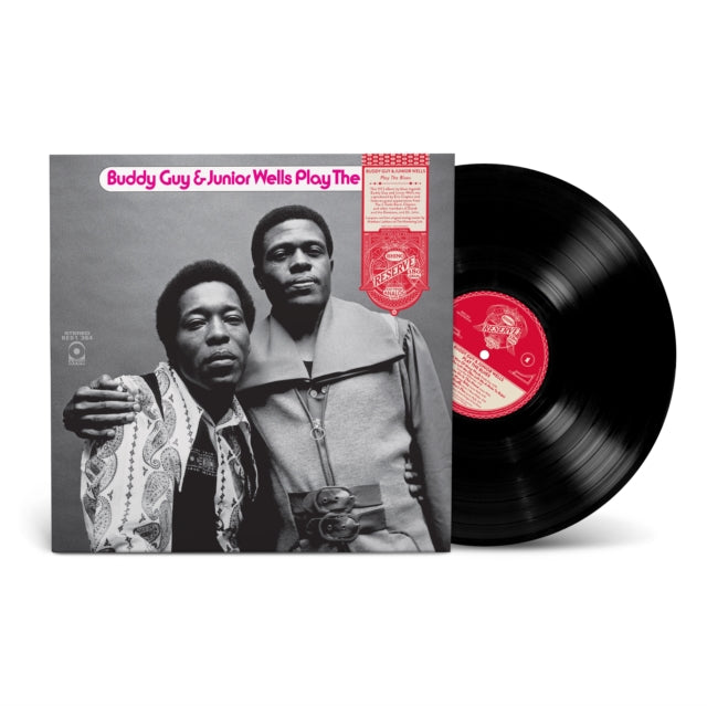 Black and white album cover of Buddy Guy and Junior Wells with arms around each other. Red text at top saying "Buddy Guy & Junior Wells Play The" with Rhino Reserve Red label blocking the rest of the text. Black vinyl record with red label sticking out of the side of the sleeve.
