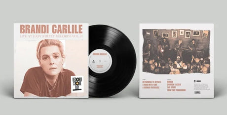 Vinyl record with Brandi Carlile album cover and additional artwork on a gray background, shown with a black vinyl record