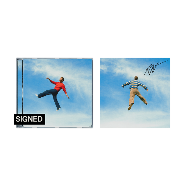 Alex Warren "Wildchild" CD album cover shown with a signed art card insert