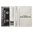 Charli XCX "Music, Fashion, Film" cassette tape in a clear case with a white cover with simple text of the album and artist name on it