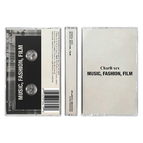 Charli XCX "Music, Fashion, Film" cassette tape in a clear case with a white cover with simple text of the album and artist name on it
