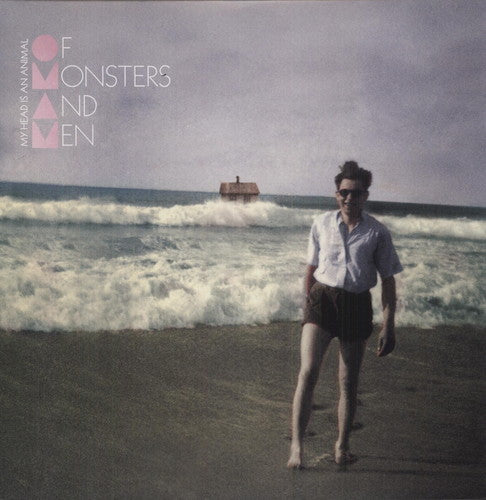 Album cover with a person on a beach and text 'Of Monsters and Men' at the top.