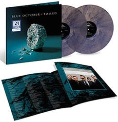 Blue October "Foiled" album cover shown with a lyric booklet and 2 blue marble colored vinyl records