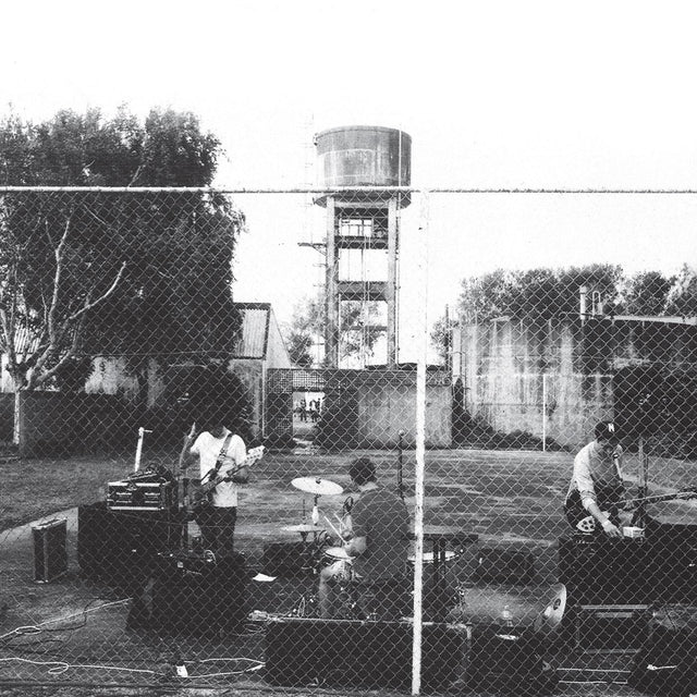 Cover for Royal Headache album showing black and white photo of the band playing behind a chain link fence in front of a tree and water tower.