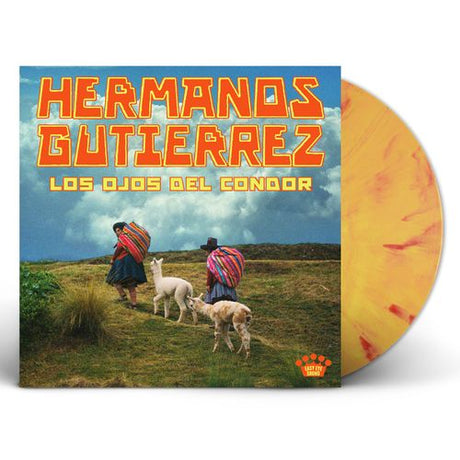 Vinyl record with cover featuring 'Hermanos Gutierrez' and image of people with llamas in a field.