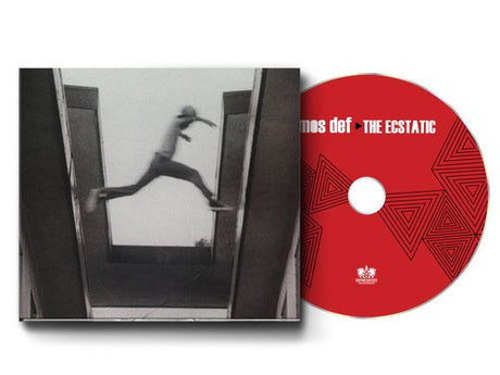 Album cover with a black and white photo of a person jumping from one building to another, and a red disc labeled mos def 'The Ecstatic'.