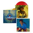 A vinyl record album set shown on a white background, featuring a red vinyl disc partially visible behind two album covers. The covers display colorful portraits and text reading 'HAPPINESS ANYTIME' twice in a circle around Leon Bridges on a boat, plus two additional images of Leon on inner sleeves of the album.