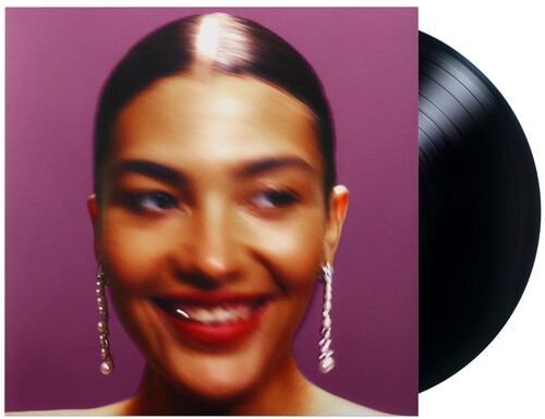 Olivia Dean "Messy" album cover with black vinyl. 