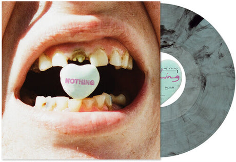 Nothing "A Short History of Decay" album cover shown with a grey smoke colored vinyl record