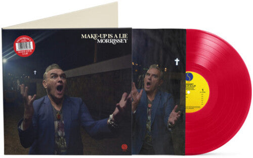Red vinyl record with Morrissey "Make-up is a lie" album cover featuring a Morrissey with an open mouth, on a white background.