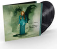 Tori Amos "In Times of Dragons" album cover shown with two black vinyl records