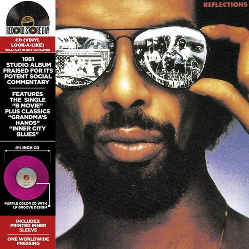 Reflections album cover with Gil Scott-Heron wearing sunglasses reflecting album cover design, with text on the left side.