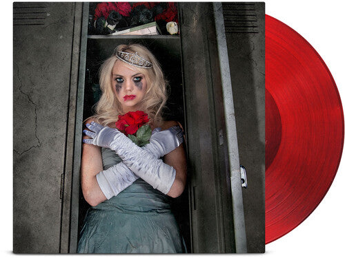 Falling in Reverse "The Drug in me is you" album cover featuring a person in a costume holding a red rose, shown with a red vinyl record