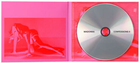 CD case with a red silhouette and 'Madonna Confessions' CD inside