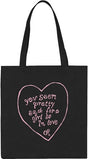 Black tote bag with pink heart-shaped text on a white background