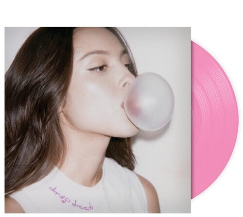 Drop Dead album cover featuring Olivia Rodrigo blowing bubble gum shown with  a pink 7 inch vinyl record 