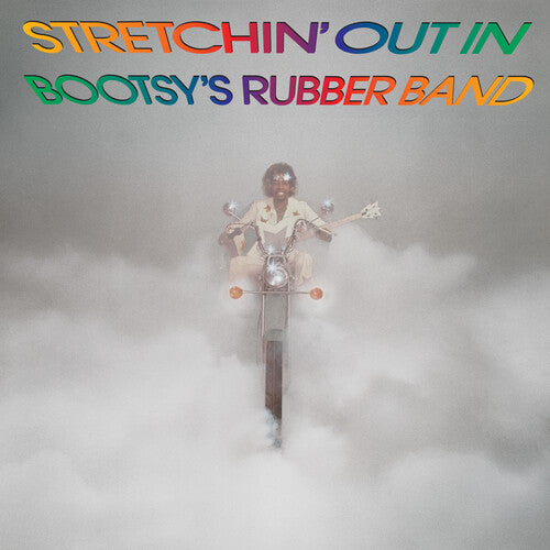 Album cover with a person on a motorcycle in a cloud of smoke and colorful text 'Stretchin' Out In Bootsy's Rubber Band' at the top.