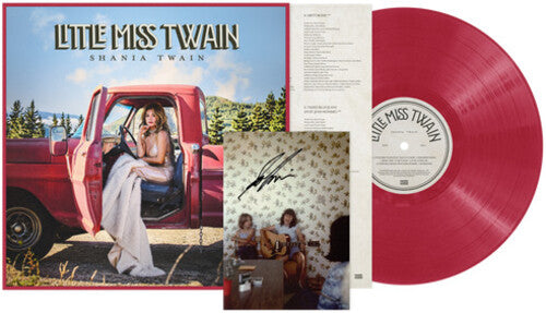 Little Miss Twain Shania Twain vinyl record album package, featuring a red translucent LP, printed cover art with a red pickup truck and woman, an interior track insert page, and a signed photo insert.