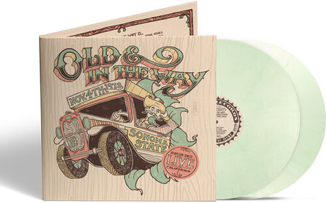 Turquoise text of 'Old & In The Way' above graphic of man driving old car with 'Sonoma State' on side of car on top of wood grain backdrop record sleeve and two honeydew colored vinyl records sticking out of side of sleeve.