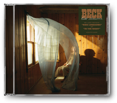 CD album cover for Beck's 'Ride Lonesome' with the title, featuring Beck sitting on a chair covered partially by sheer white curtains flowing from a window in a wood-paneled room.