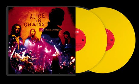 two yellow vinyl records sticking out of the side of a record sleeve that features text "Alice In Chains Mtv Unplugged" as well as images of the band set against an orange and yellow backdrop