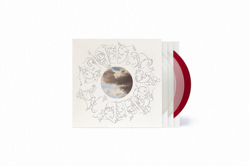 A vinyl record album shown in its sleeve, featuring a cream-colored cover with a delicate line-art mandala design and a circular window showing a cloudy sky. The records are clear and red colored, partially visible behind the sleeve.