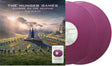 Vinyl record sleeve for The Hunger Games Sunrise On The Reaping the Album showing people standing in a circle around a statue. Also two purple colored records against a white backdrop