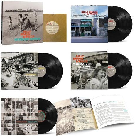 Box set for Billy Bragg & Wilco Mermaid Avenue featuring the slip case, 7" record, 4 separate LP records, and an open booklet against a white backdrop