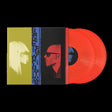 A vinyl record album shown against a black background, with the sleeve partially open to reveal two translucent red-orange records. The sleeve artwork features a split design: a yellow side with a profile image of Erykah Badu in sunglasses and a red/black side with a profile image of The Alchemist in sunglasses, and a blue vertical band with text.