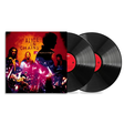 Alice in Chains 'MTV Unplugged' 12-inch vinyl LP set, showing the album cover sleeve featuring various images of the band set against an orange and yellow backdrop, alongside two black vinyl records with red center labels on a white background.