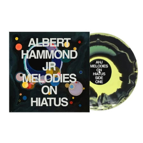 Albert Hammond Jr. - Melodies On Hiatus album cover and green, yellow, & black vinyl. 